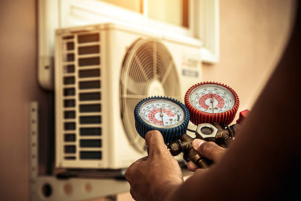 Professional Hvac Maintenance technician working in Kittredge, CO